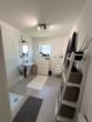 Badezimmer - Moderne 2-Zimmer-Erdgeschosswohnung mit Terrasse, hochwertiger Ausstattung & optionaler Einbauküche